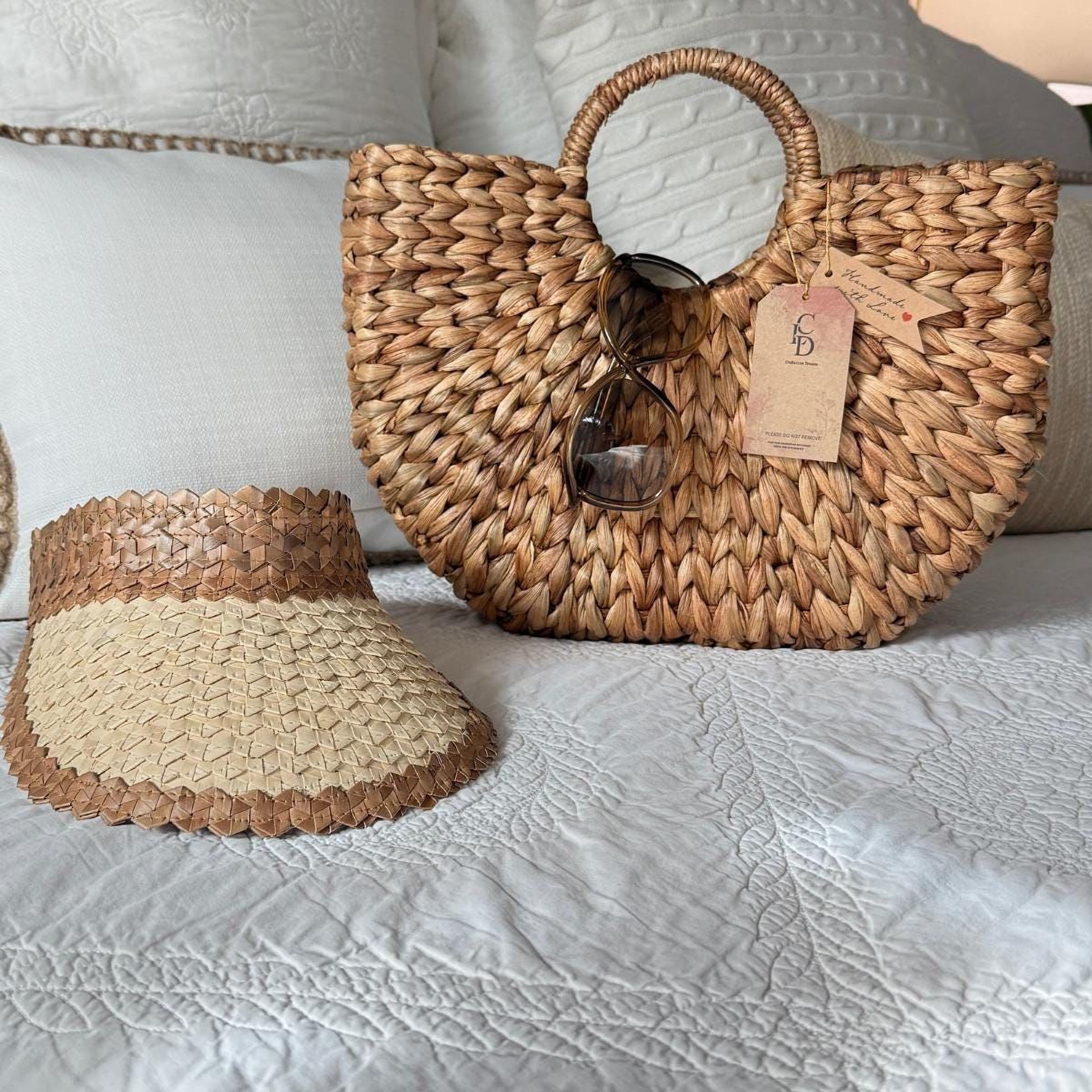a woven straw hat and a woven straw handbag placed on a white bedspread.