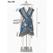 A mannequin wearing a blue and white floral wrap dress, with measurements and a waist wrap size provided.