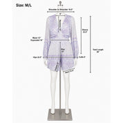 a mannequin wearing a purple and white patterned outfit, including a skirt and a top. The mannequin is standing on a mannequin stand, and there are measurements provided for the different parts of the outfit.