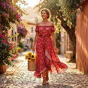 A woman in a red floral dress walks down a cobblestone street, carrying a basket of sunflowers.