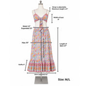 a mannequin wearing a colorful floral print dress and a matching bra top. The dress has a ruffled skirt and a tie waist, and the bra top has a tie detail. The dress appears to be a two-piece outfit, with the skirt and the bra top combined. The image provides measurements for the dress, including waist, hips, bust, length of the skirt, and hem.
