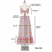 a mannequin wearing a colorful floral print dress and a matching bra top. The dress has a ruffled skirt and a tie waist, and the bra top has a tie detail. The dress appears to be a two-piece outfit, with the skirt and the bra top combined. The image provides measurements for the dress, including waist, hips, bust, length of the skirt, and hem.