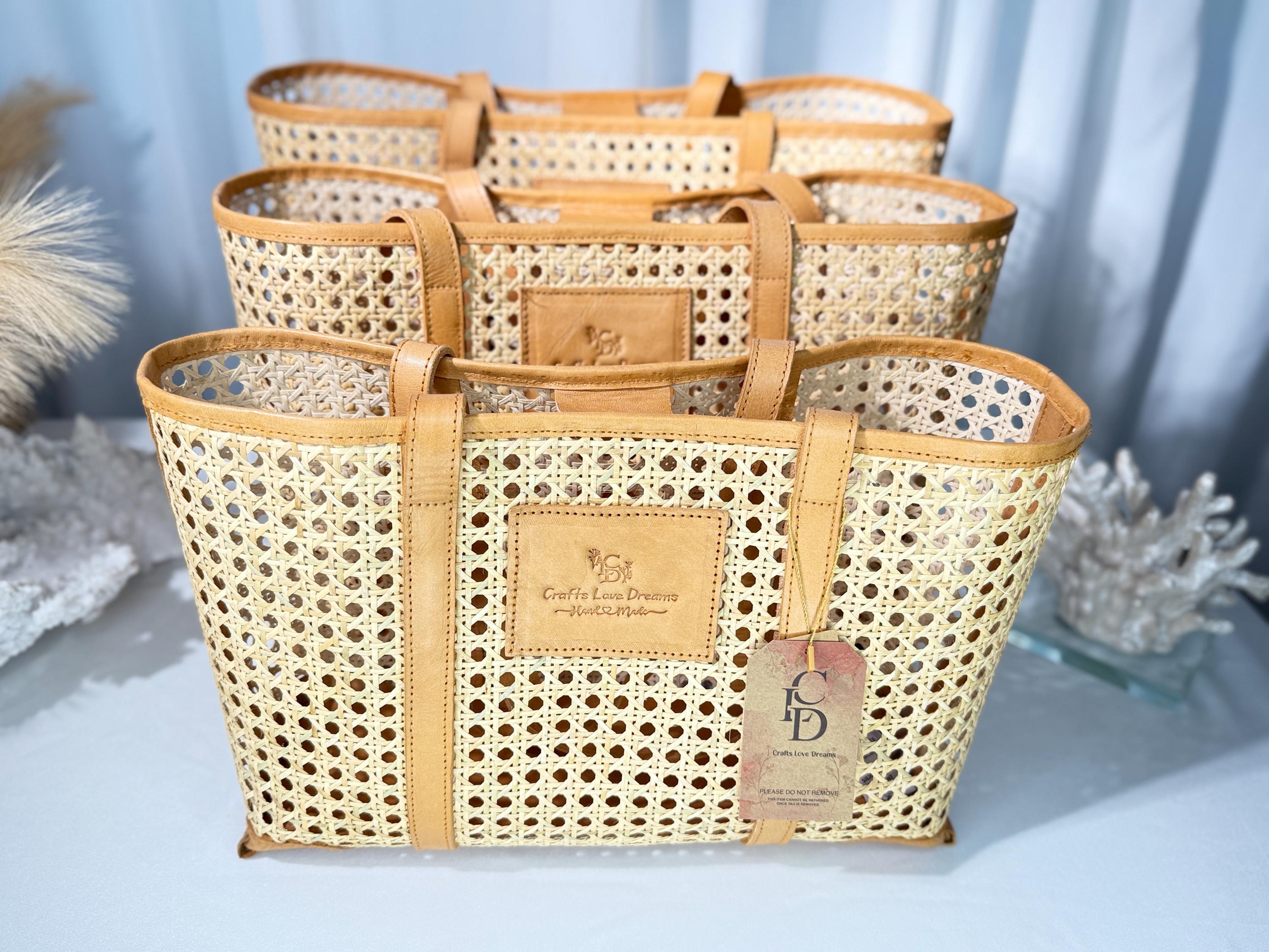 a set of three woven tote bags with a distinctive pattern, placed on a table against a blue background.