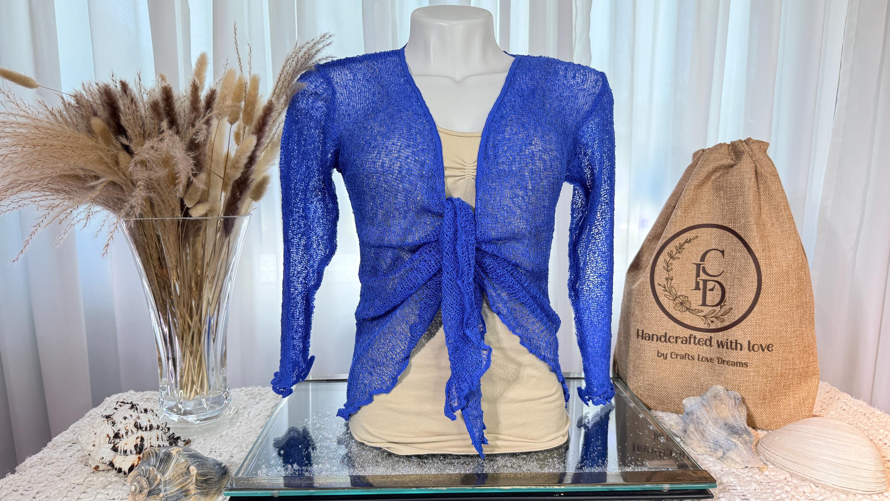 Royal Blue sheer knit cardigan shrug with front tie on a mannequin from Crafts Love Dreams
